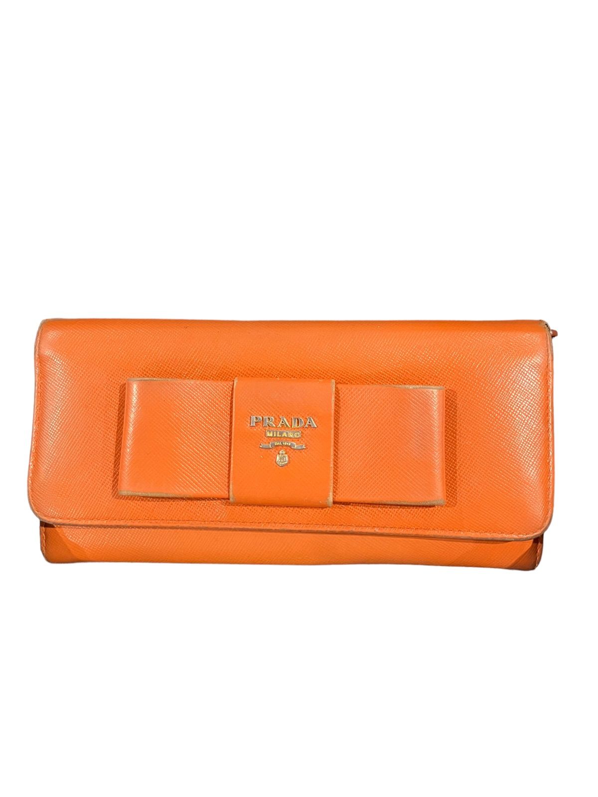 PRADA プラダ 長財布 サフィアーノ リボン オレンジ - メルカリ プラダ