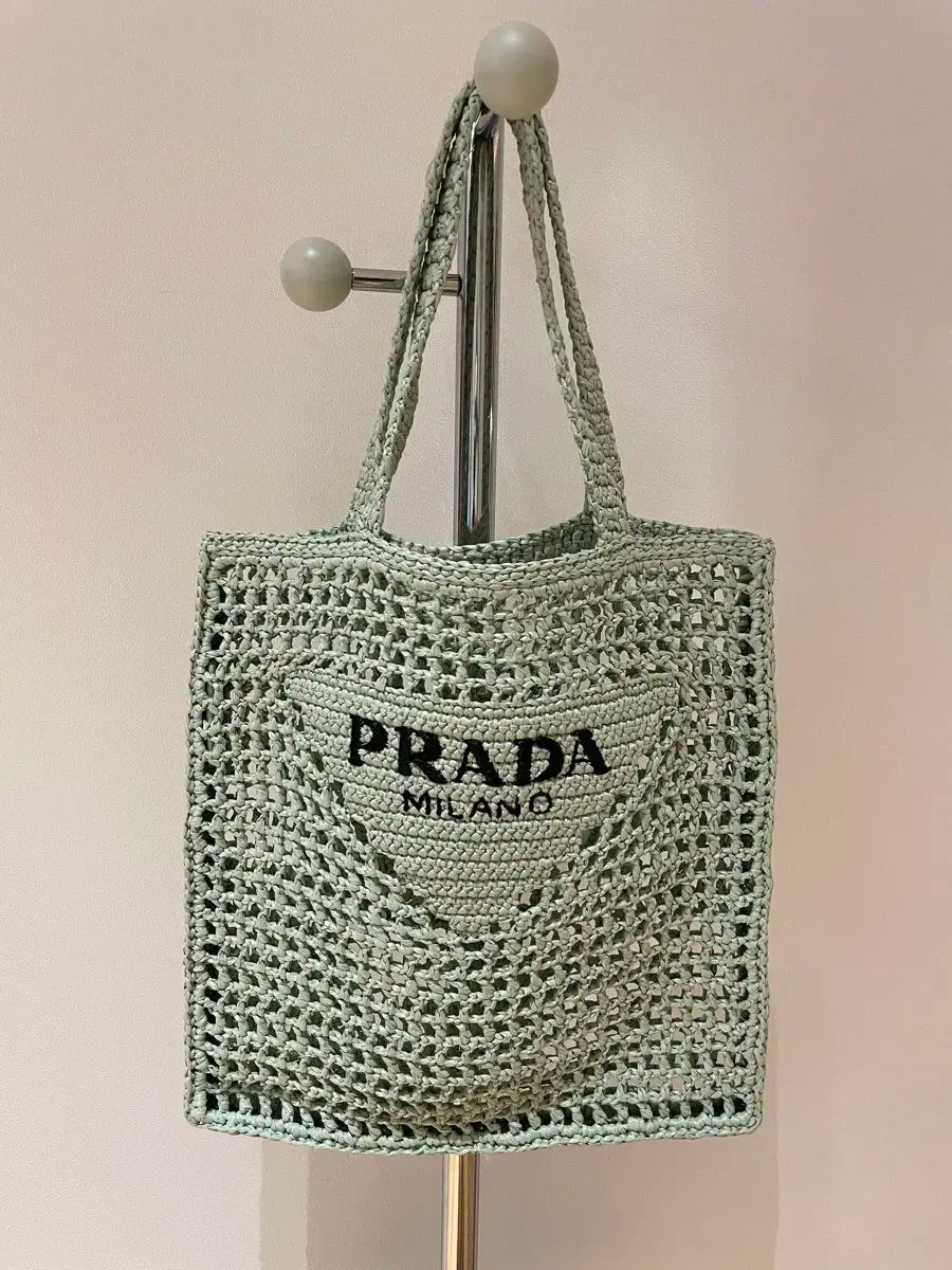 PRADA(プラダ) ラフィアバッグ - メルカリ
