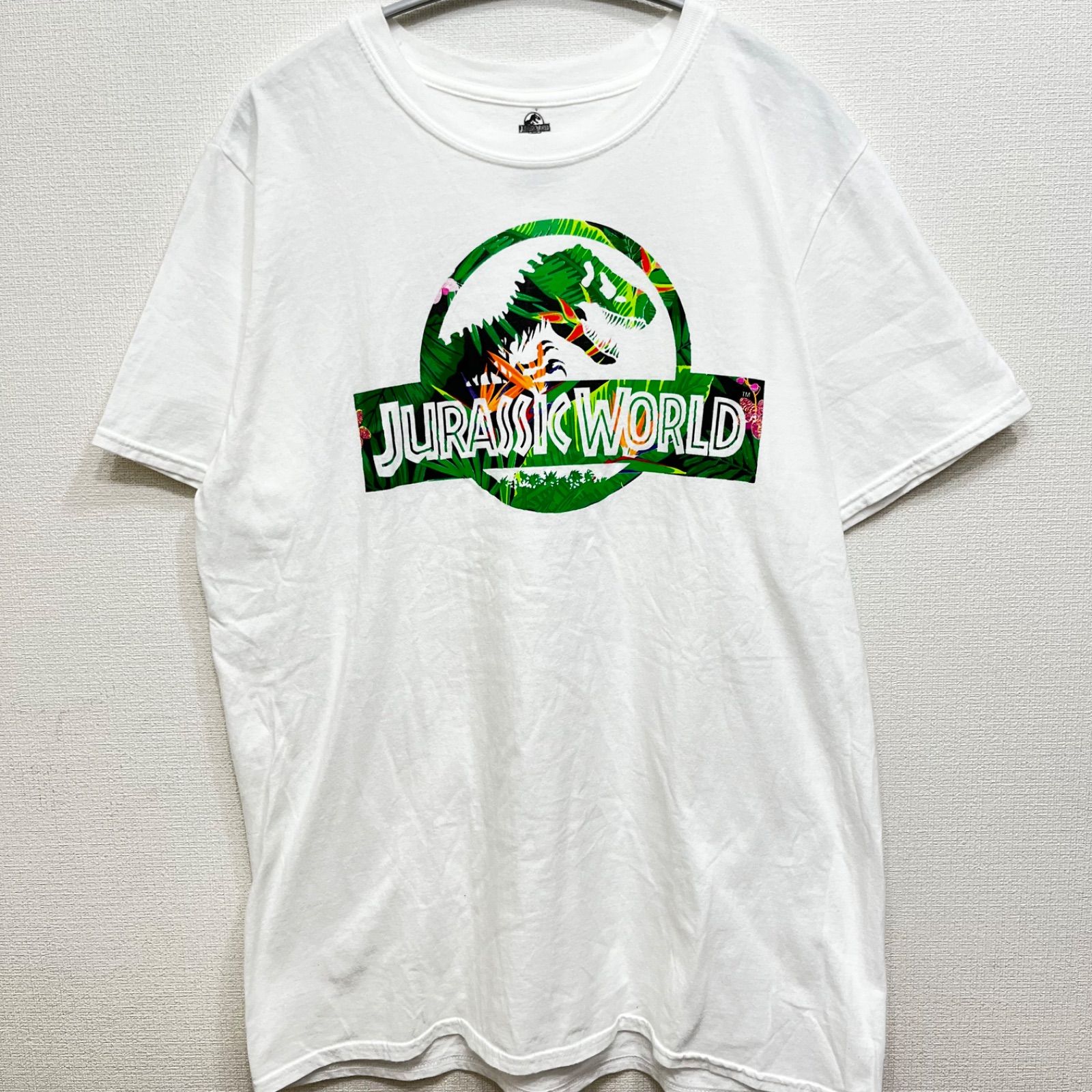 ジュラシックワールド ジュラシックパーク Tシャツ Lサイズ ムービーTシャツ ロゴ 映画 古着 ユーズド ヴィンテージ ビンテージ ロック Tシャツ ホワイト グッズ アメカジ アメリカン ストリート カジュアル USA アクション SF 恐竜 - メルカリ