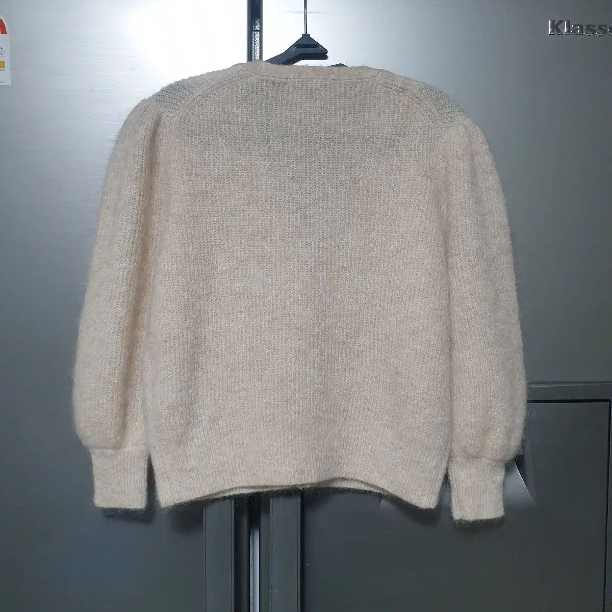 マージュ パフボール パールボタン モヘア カーディガン