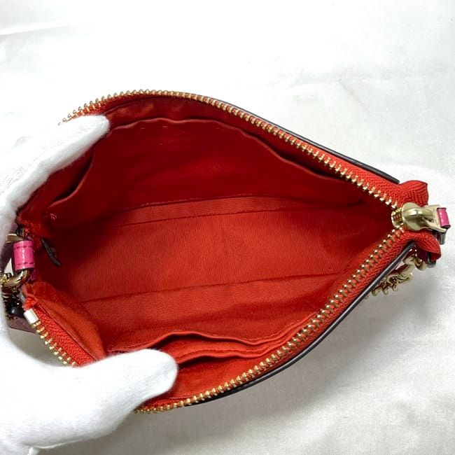 Coach Pink PVC Leather Accessory Pouch with Studs and Floral