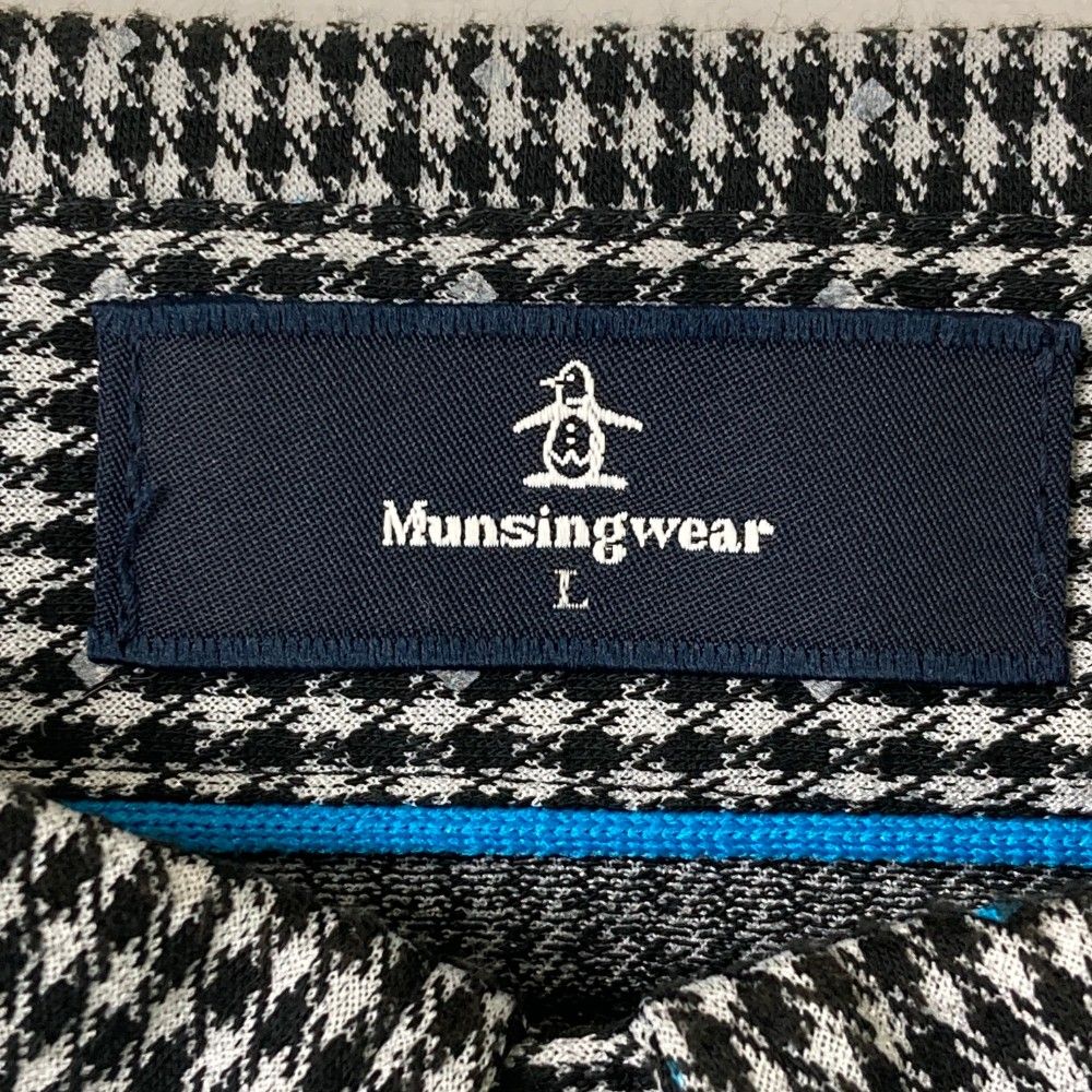 サイズ：L MUNSING WEAR マンシングウェア  長袖ポロシャツ 総柄 ブラック系 [240101423274] ゴルフウェア メンズ ストスト サイズ：L MUNSING WEAR マンシングウェア 長袖ポロシャツ 総柄