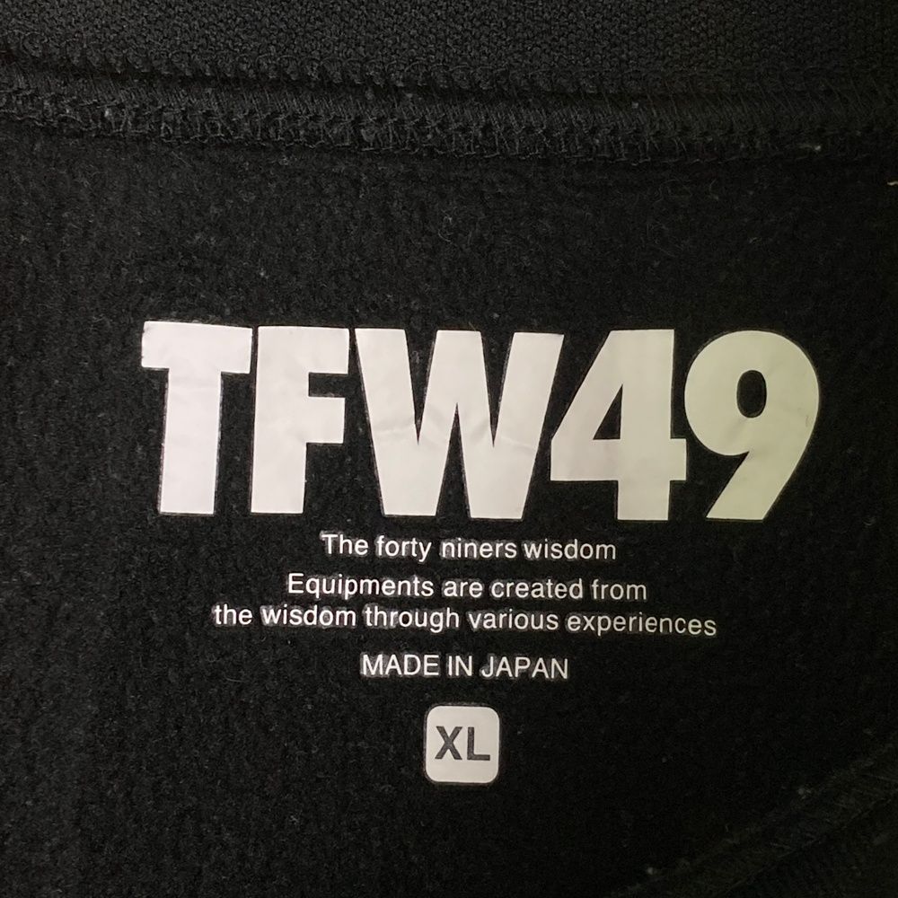 サイズ：XL TFW49 ティーエフダブリューフォーティーナイン  裏起毛ハイネック長袖Tシャツ  ブラック系 [240101481231] ゴルフウェア メンズ ストスト サイズ：XL TFW49 ティーエフダブリューフォーティーナイン 裏