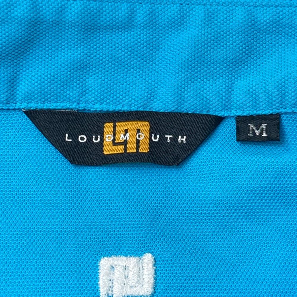 サイズ：M LOUD MOUTH ラウドマウス ML760608 半袖ポロシャツ ロゴ総柄 ブルー系 [240101430022] ゴルフウェア メンズ ストスト サイズ：M LOUD MOUTH ラウドマウス ML760608 半袖ポロシャツ