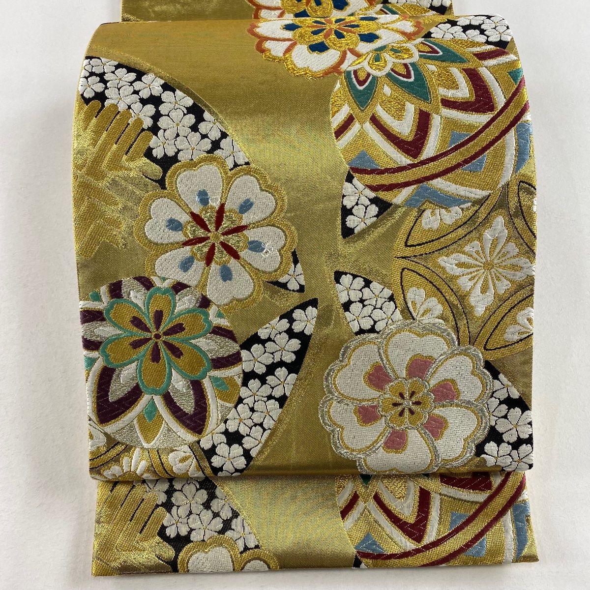 袋帯 美品 秀品 振袖向き 煌き 桜 七宝 唐織 金銀糸 金色 六通