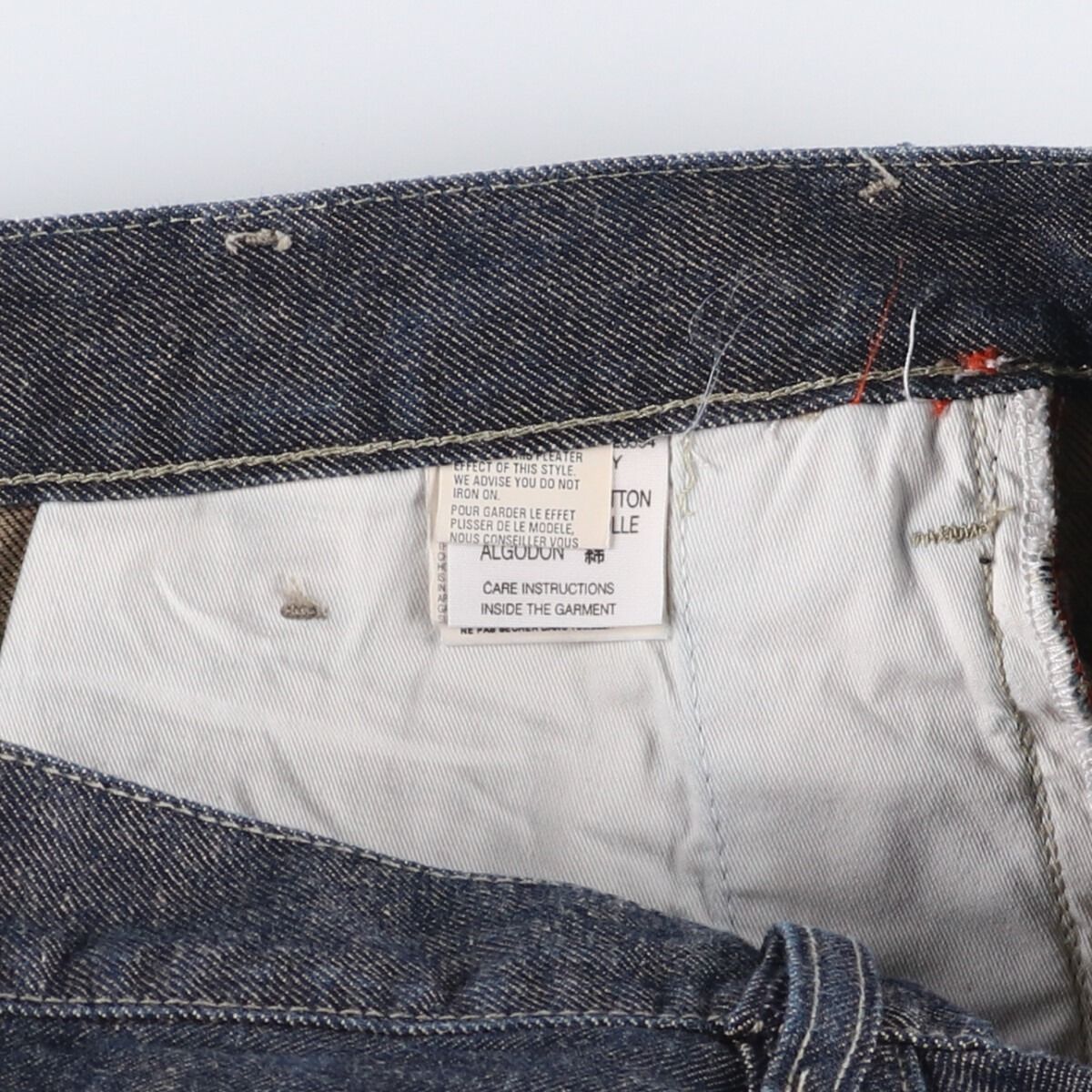 テーパードデニムパンツ