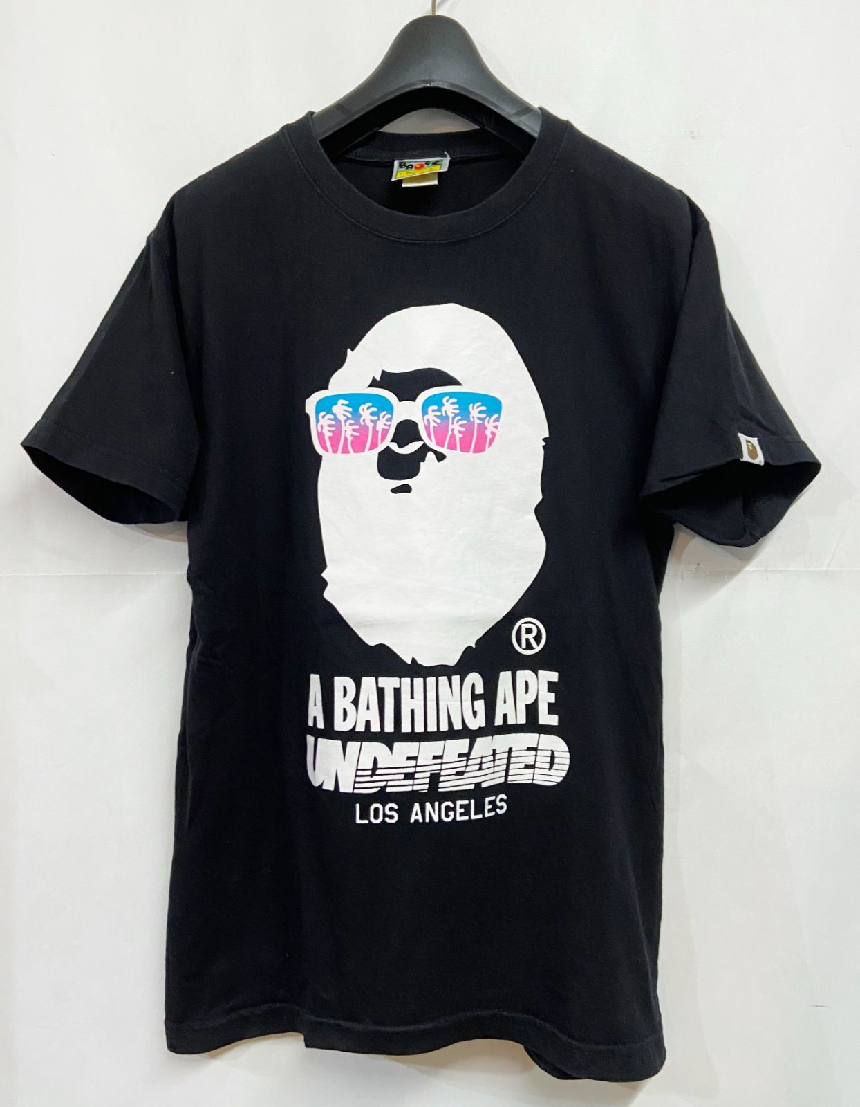 A BATHING APE x UNDEFEATED ｜アベイシングエイプ アンディフィーテッド BAPE HEAD Tシャツ 猿顔 ベイプ