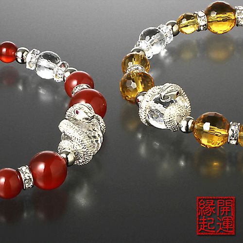 金運蛇の宝石ブレス へびの皮お守り付き - メルカリ