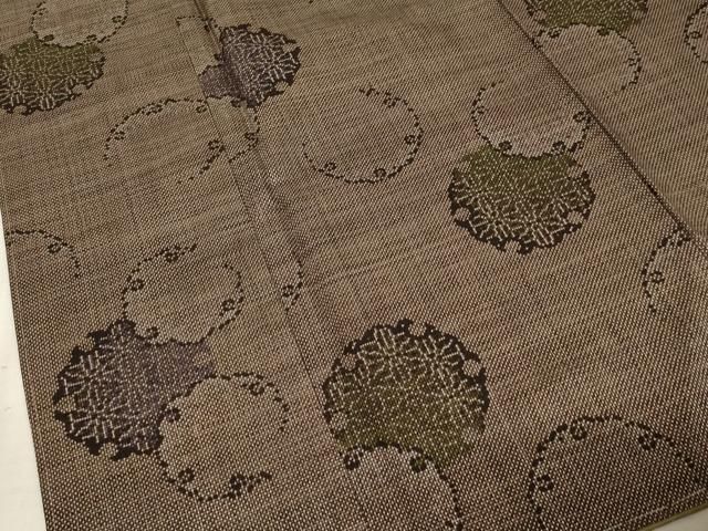 平和屋着物○本場大島紬 古代染色 純泥染 手織 一元7マルキ 雪輪重ね文