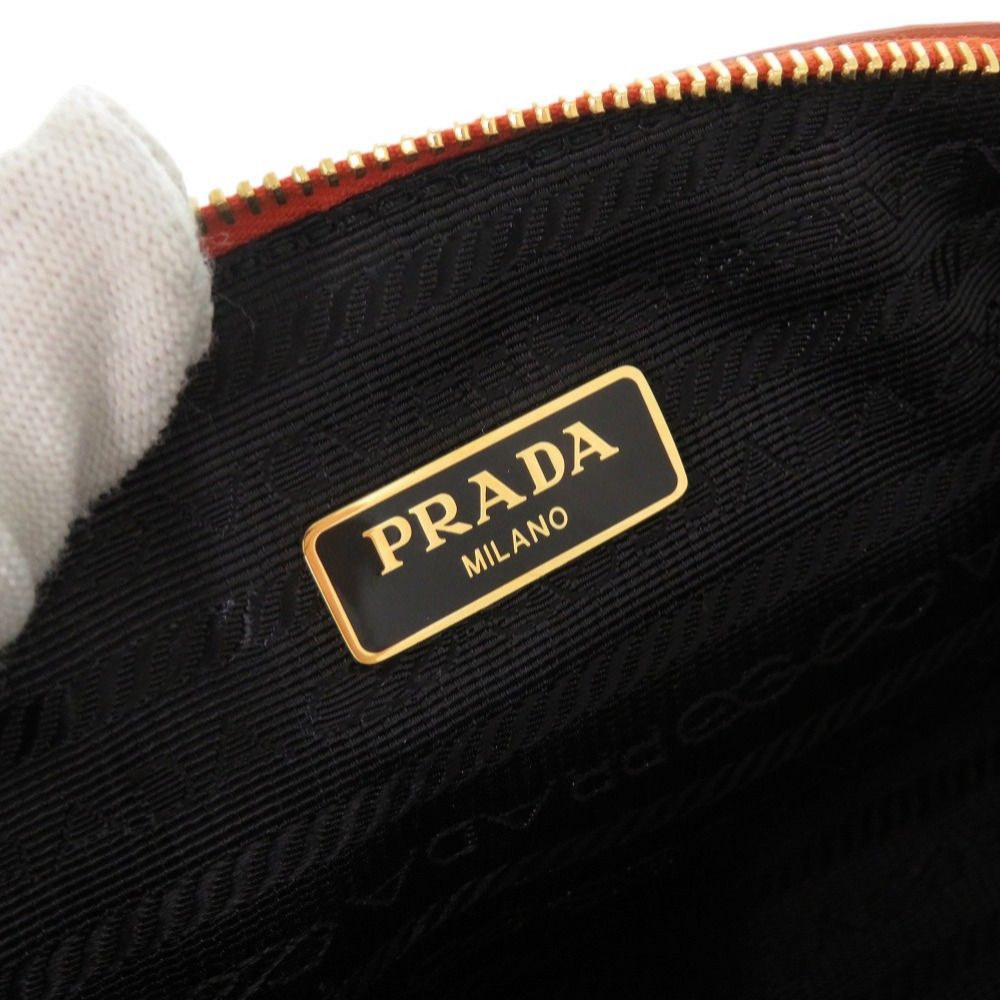 ～5/24★複数割★新品★プラダPRADAバラデザイン布製ポーチ(オレンジ) 5/24☆複数割☆新品☆プラダPRADAバラデザイン布製ポーチ(オレンジ)