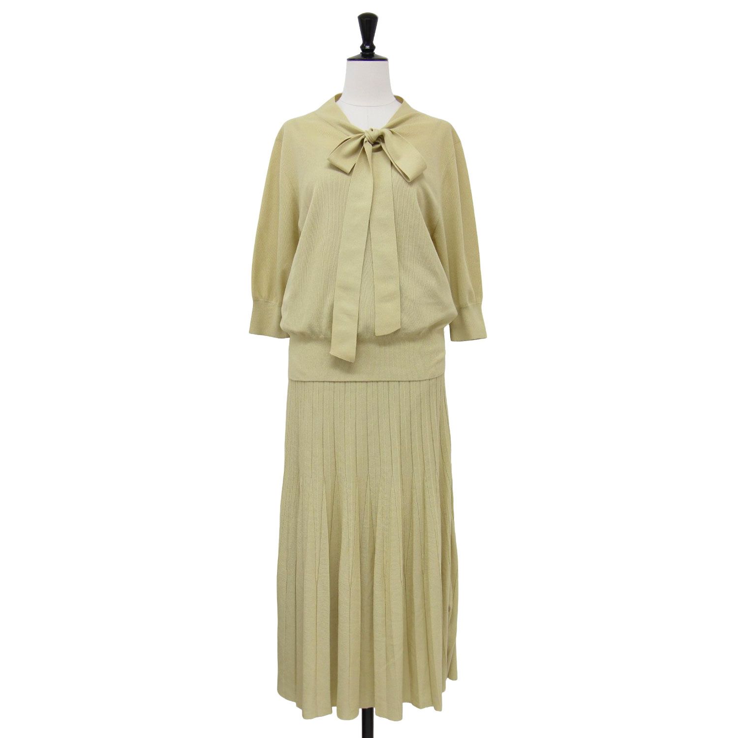 Mila Owen ミラ オーウェン イエロー サイズ 1 M | 22秋冬 ボウタイニット プリーツスカート セットアップ | 7分袖 ロング丈 リボン ウエストゴム フ ハイゲージ レディース