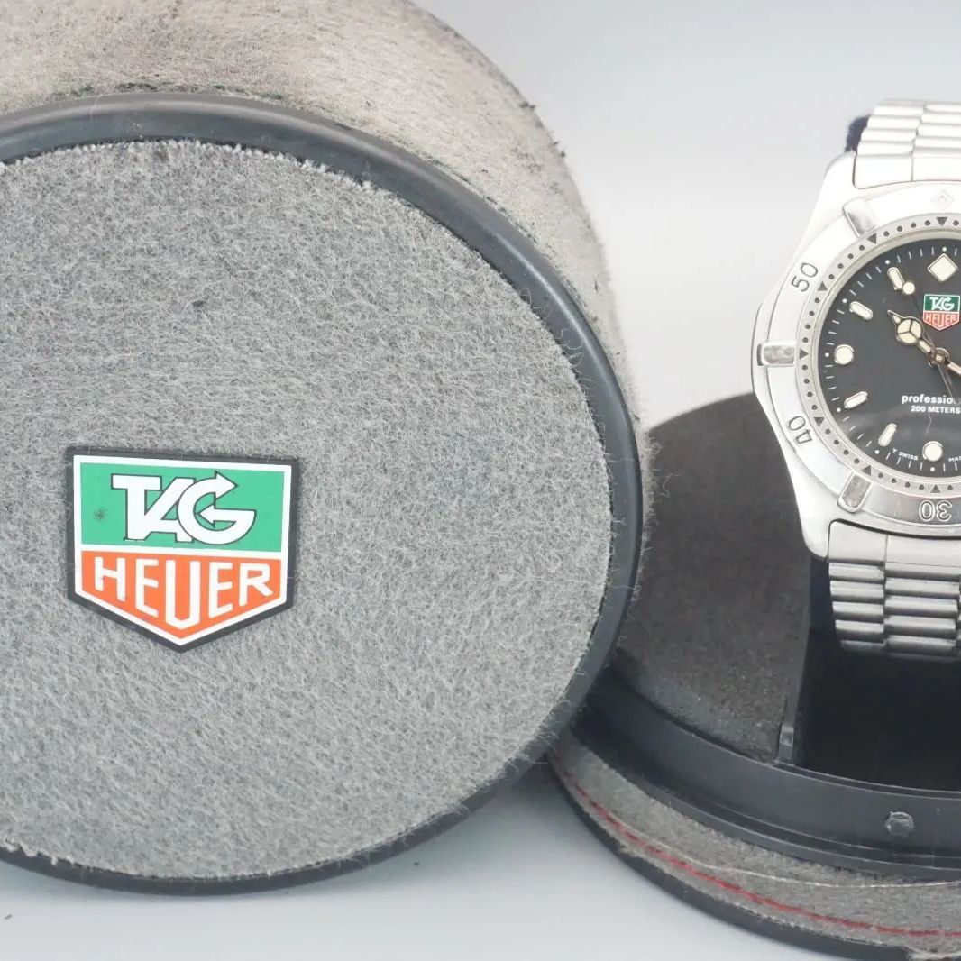 稼動品 新品電池 タグホイヤー Tag Heuer プロフェッショナル 2000 WE1110-R クオーツ デイト ブラック文字盤 メンズ腕時計