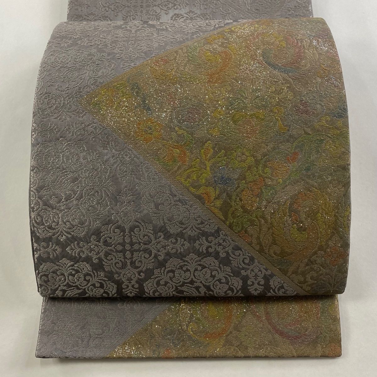 袋帯 秀品 金彩月光錦 花唐草 鳳凰 箔 金彩 灰紫 お太鼓柄 正絹