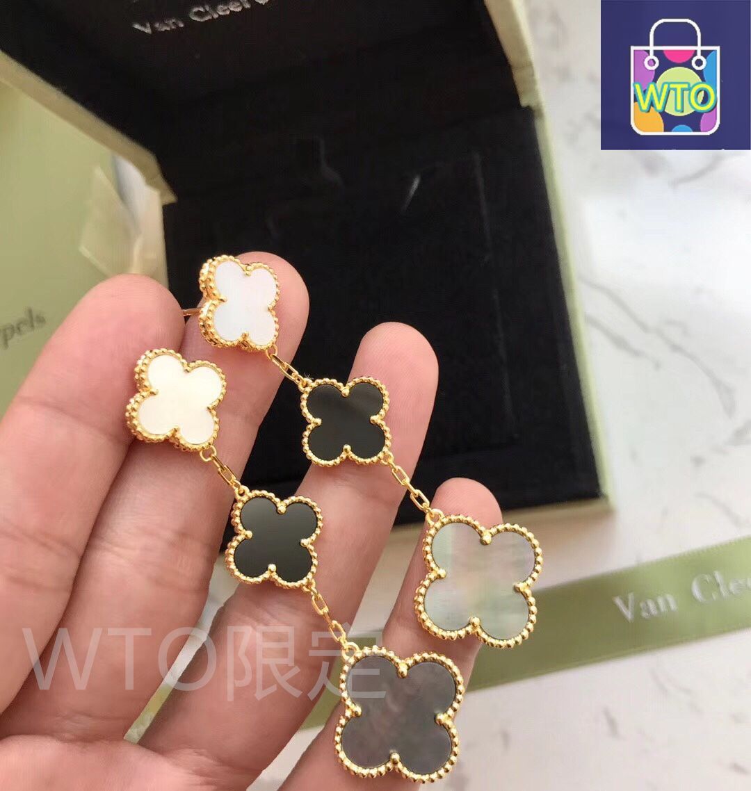 VCA Van Cleef & Arpels 三つの花のイヤリングと四つ葉の