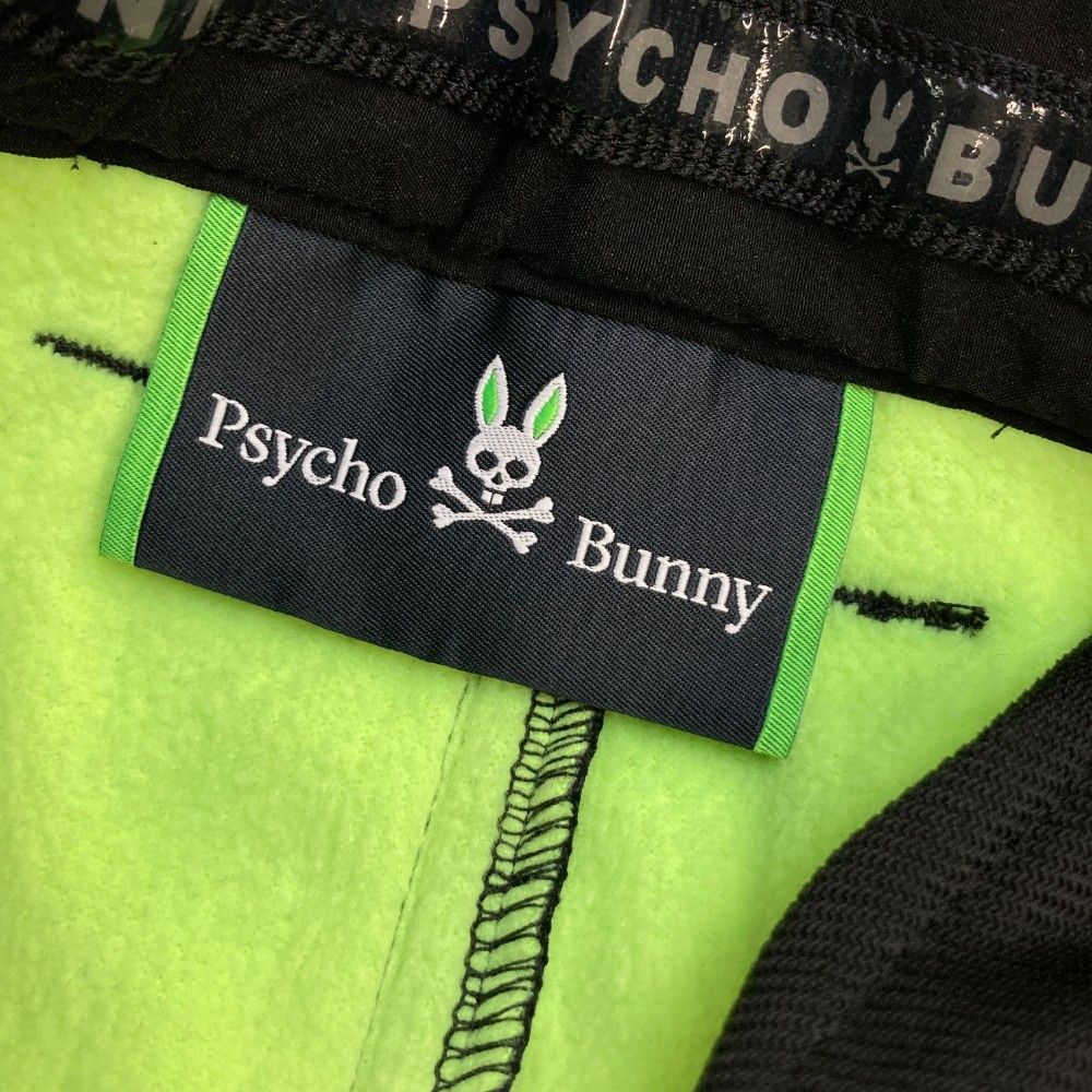 サイズ：M PSYCHO BUNNY サイコバニー ; ストレッチパンツ 裏フリース 総柄 ブラック系 [240101455393] ゴルフウェア メンズ ストスト サイズ：M PSYCHO BUNNY サイコバニー ; ストレッチパンツ 裏