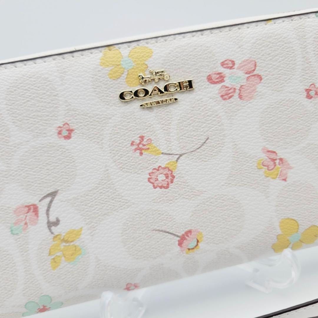 新品】COACH 長財布シグネチャーフローラルプリント花柄 長財布 - メルカリ