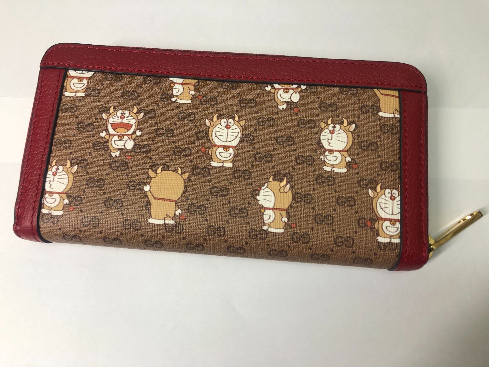 GUCCI 】□ドラえもん×Gucci コラボ 647787 財布 ウシえもん ジッピー