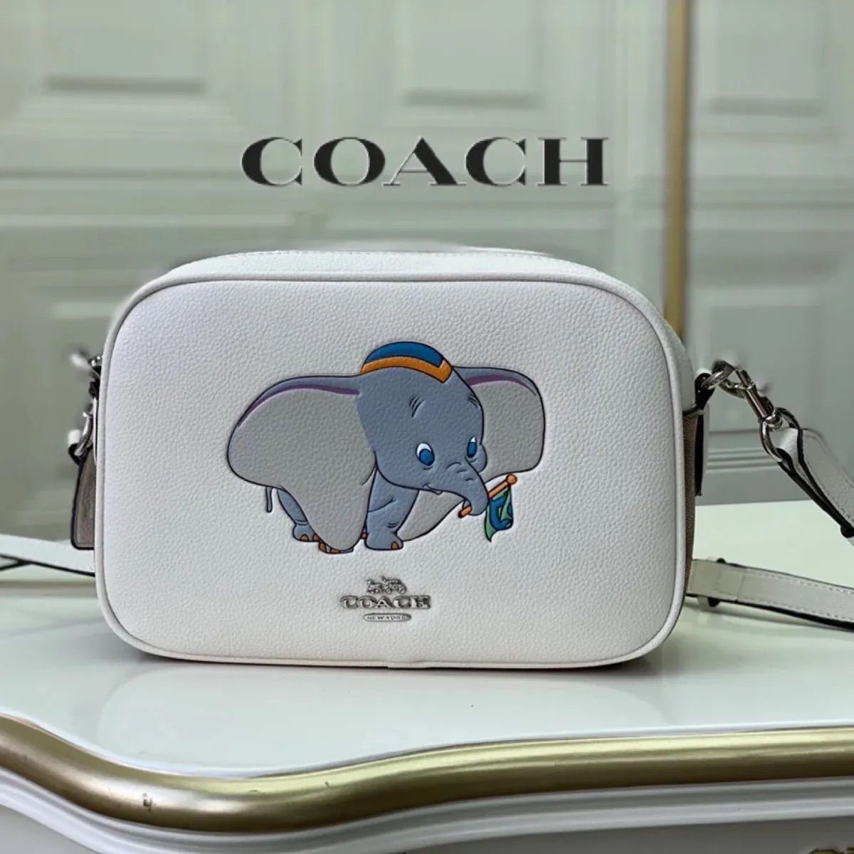 COACH コーチ ショルダーバッグ ダンボ チョークホワイト ディズニーコラボ - メルカリ