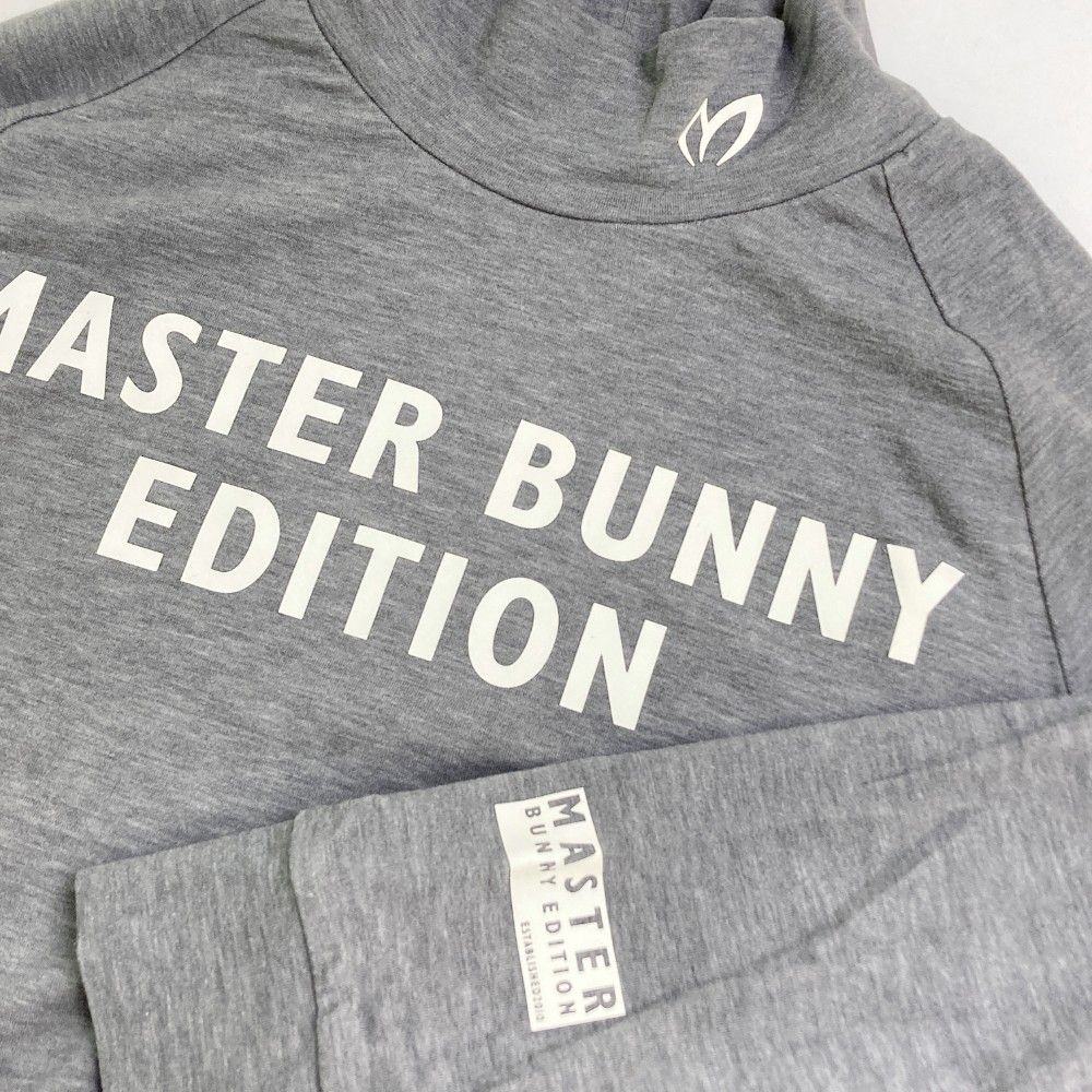 サイズ：0 MASTER BUNNY EDITION マスターバニーエディション  ハイネック 長袖Tシャツ 微起毛  ブラック系 [240101437849] ゴルフウェア レディース ストスト フルダルメッシュ×トリコット長袖ハイネックカットソー | MASTER