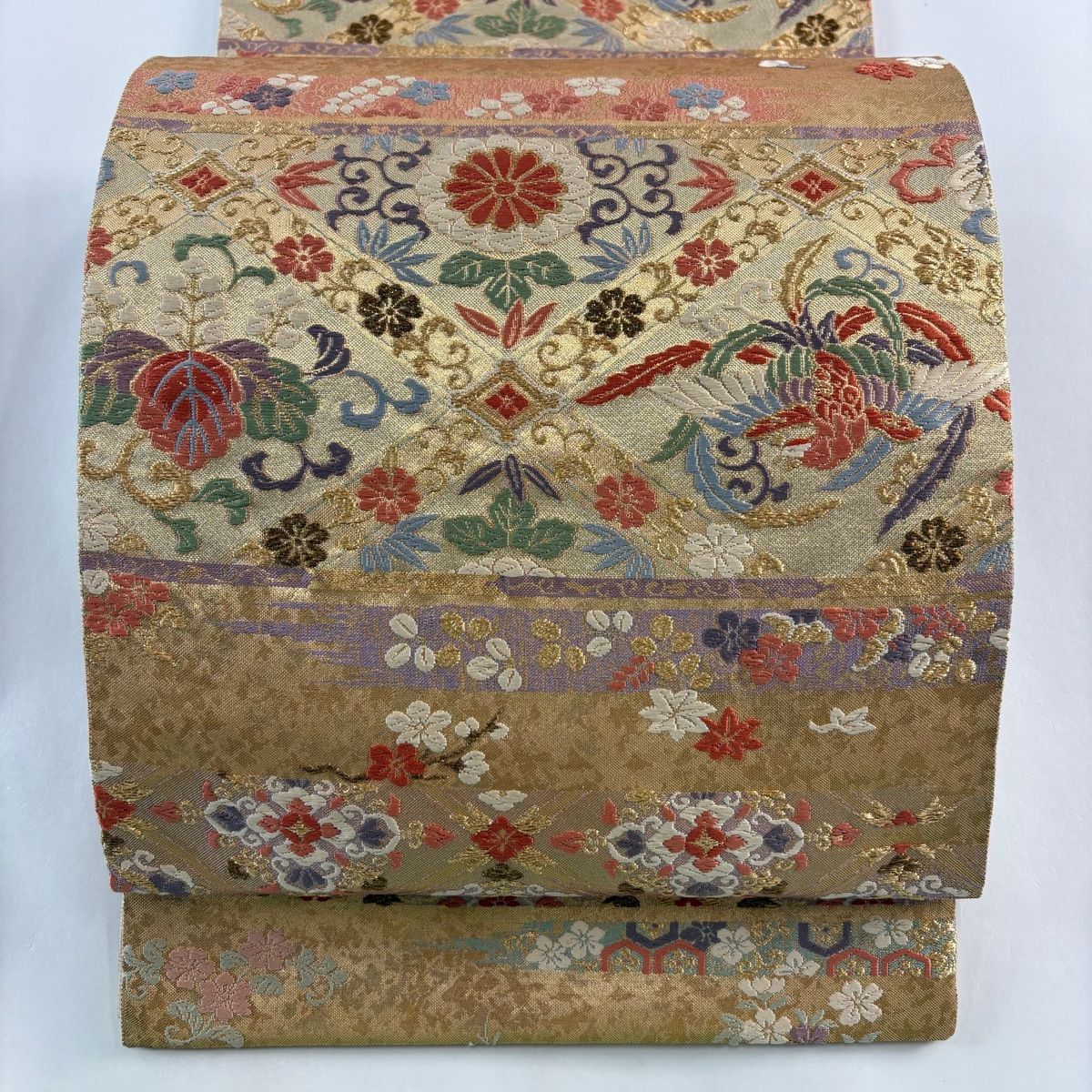 【単衣にも】上品な煌めき　箔が美しい草花柄の袋帯 袋帯 名品 花丸文 蜀江文 唐織 箔 墨色 六通 正絹 中古