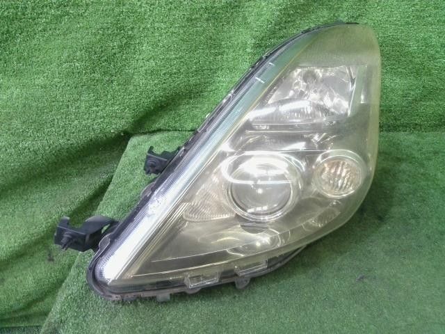 アイシス DBA-ANM10W 左 ヘッドランプ ヘッドライト ASSY プラタナ 1AZ-FSE 3Q3 FK11 81185-44350