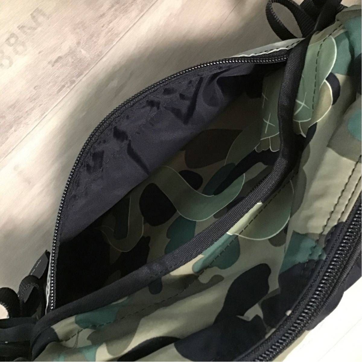 BAPE KAWS bendy 1st camo green ウエスト バッグ ☆激レア☆ KAWS bendy 1st camo green ウエスト バッグ a bathing ape