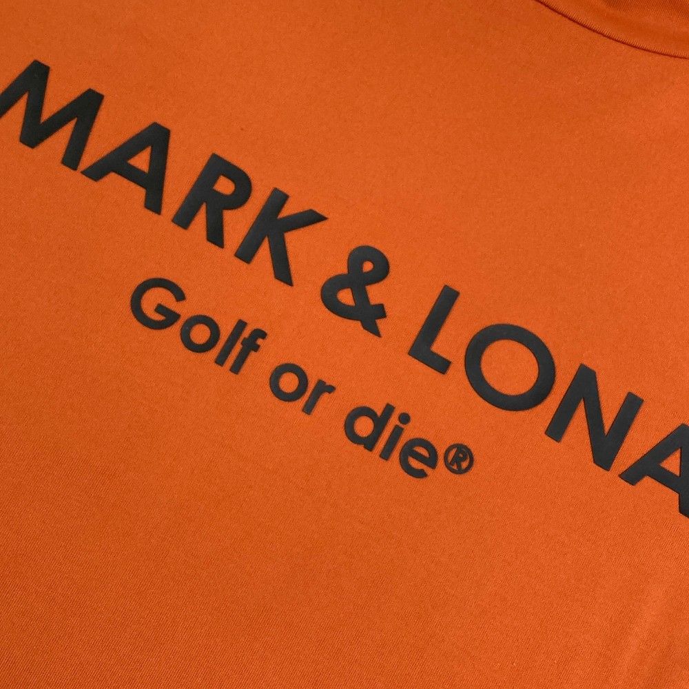 サイズ：48 MARK&LONA マークアンドロナ  ハイネック 長袖 インナーTシャツ  オレンジ系 [240101462963] ゴルフウェア メンズ ストスト サイズ：48 MARK&LONA マークアンドロナ ハイネック 長袖