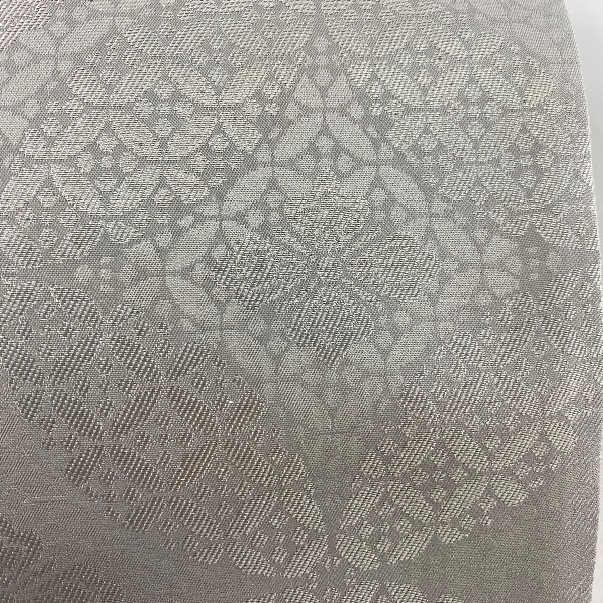 袋帯 秀品 七宝 花菱 箔 銀色 六通 正絹