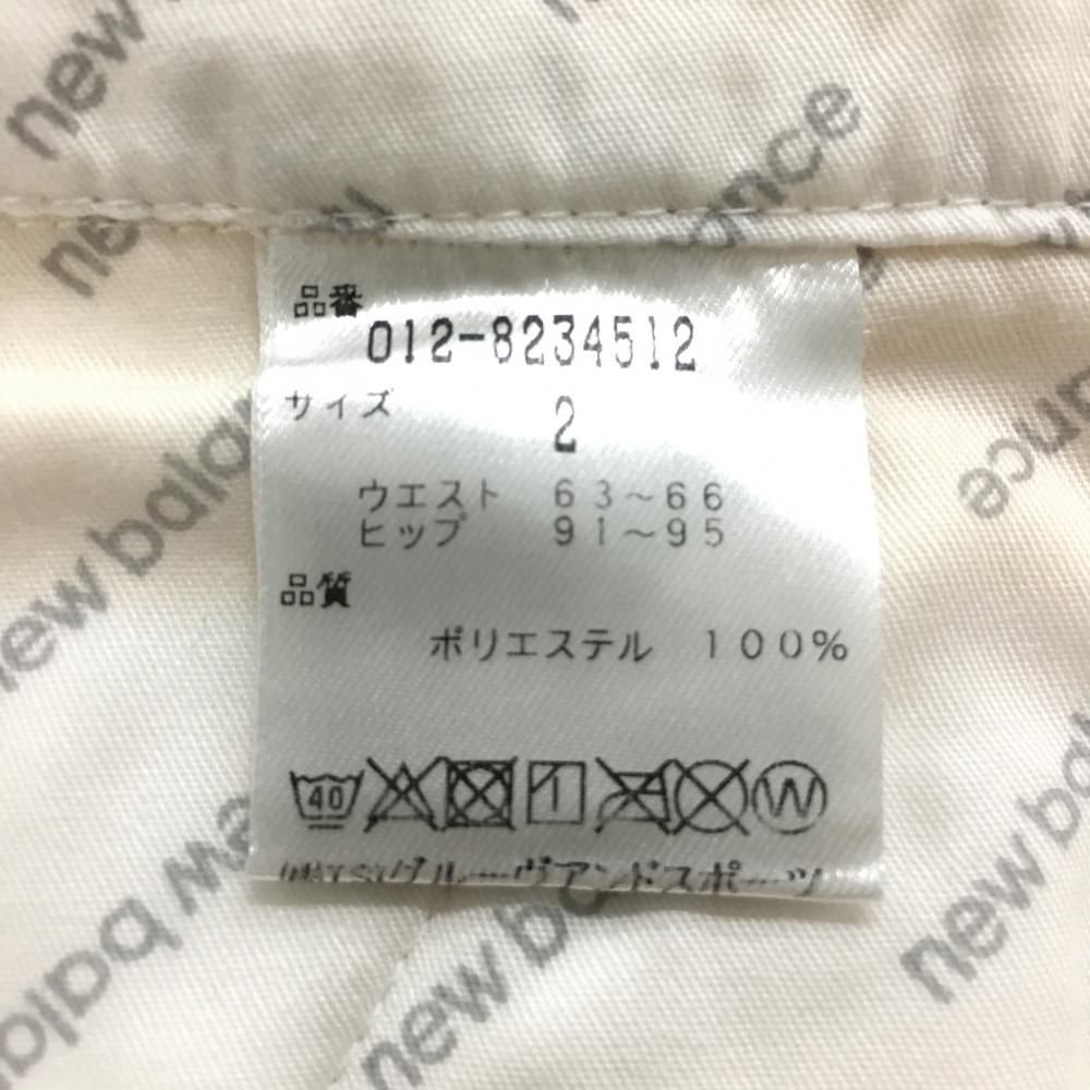 超美品】ニューバランスゴルフ スカート 白×イエロー ボーダー