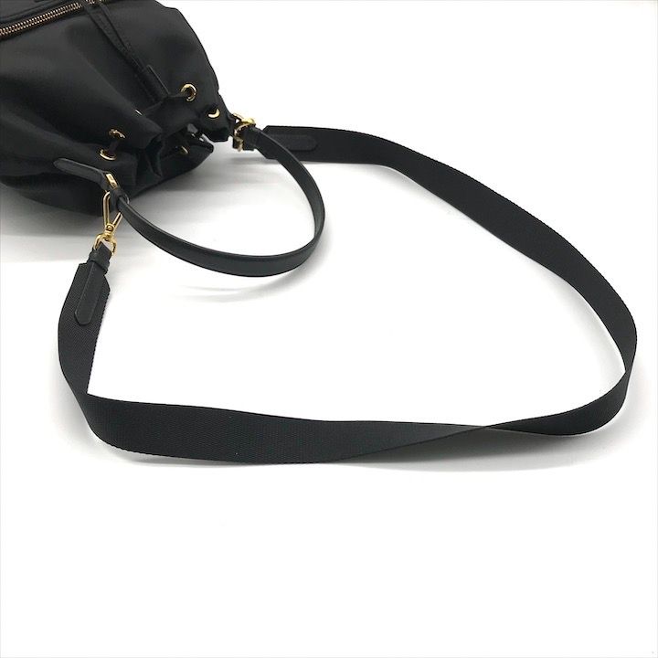 未使用保管品 PRADA プラダ 三角ロゴプレート ナイロン テスート 巾着 2WAY ハンド ショルダー バッグ カバン 鞄 ブラック k5419 未使用保管品 PRADA プラダ 三角ロゴプレート ナイロン テスート 巾着