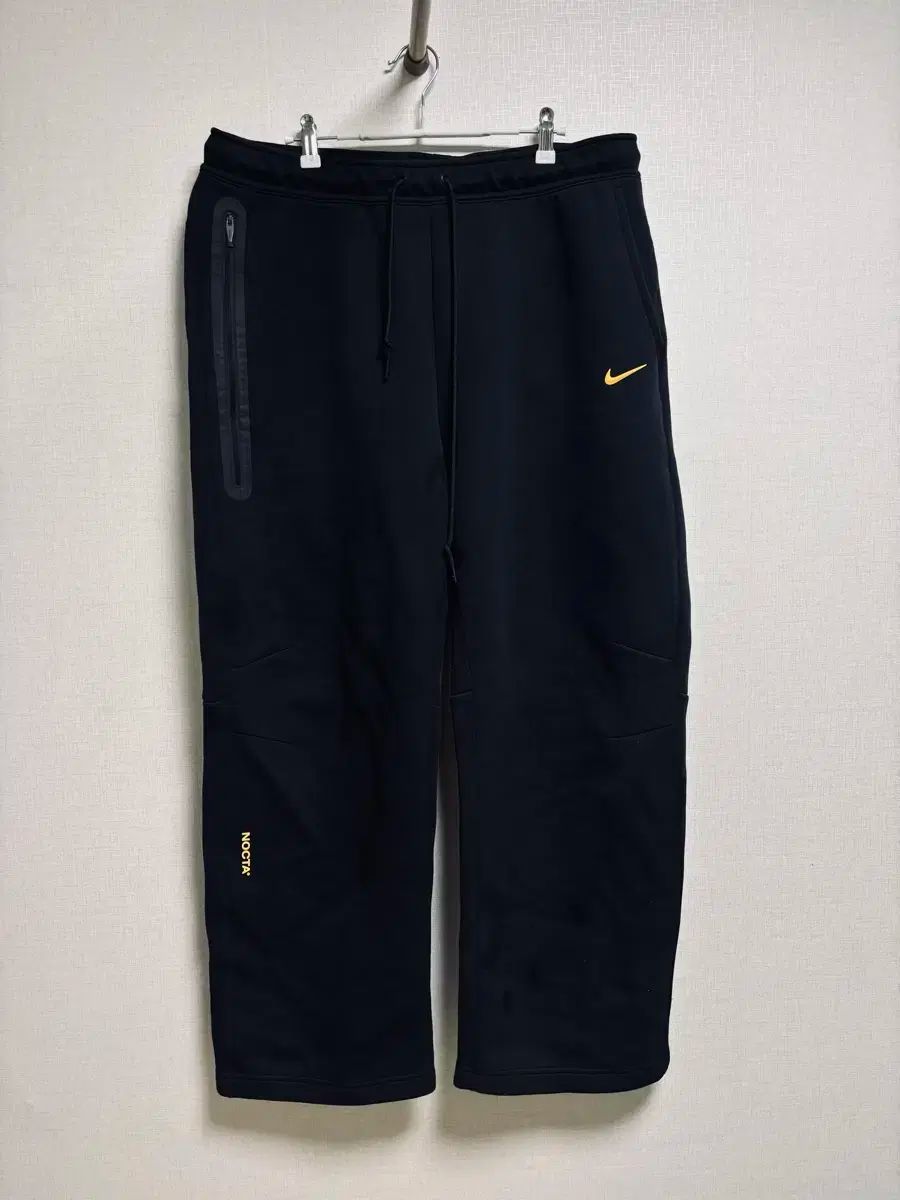 NIKE×NOCTA ノーススターナイロントラックパンツ◎黒［Ｍ］ウエストゴム US Sサイズ】Nike NOCTA ノーススターナイロントラックパンツ - メルカリ
