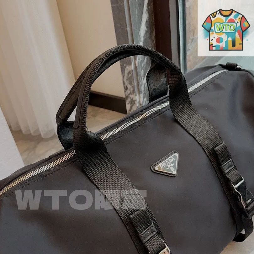 PRADA ブラック ダッフルバッグ プラダ ブラック Re-Nylon xサフィアーノレザー ダッフルバッグ | PRADA
