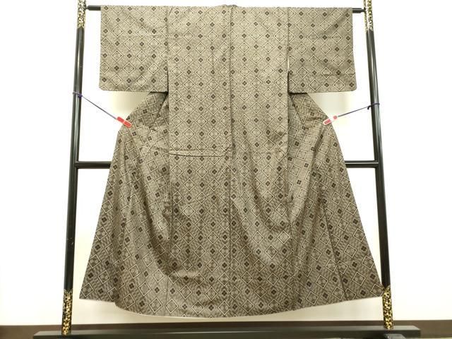 平和屋着物○希少 本場大島紬 龍郷絣 7マルキ 花菱文 正絹 逸品  