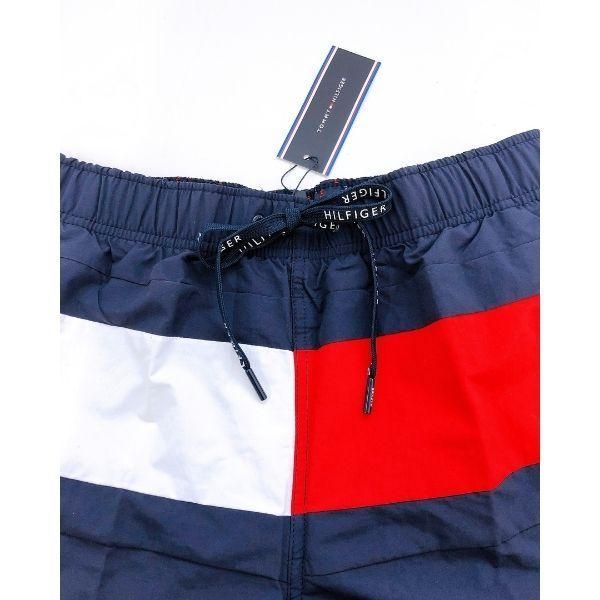 TOMMY HILFIGER ラージフラッグ スイムショーツ』夏のマストアイテム フラッグデザイン スイムパンツ : S,Mサイズ - メルカリ