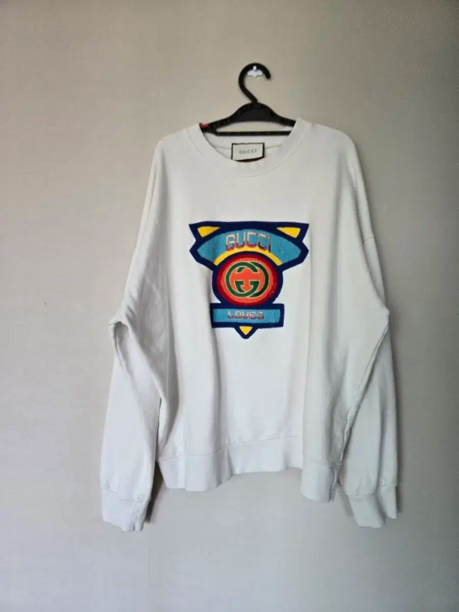 九寸名古屋帯 豆絞り 地紋 紗綾形 山 藤娘きぬたや オレンジベージュ