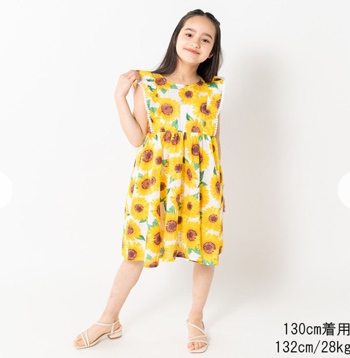 ヒマワリ柄ワンピース。未使用 ひまわり柄 ワンピース - メルカリ