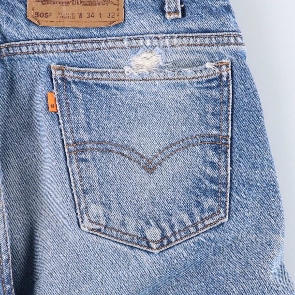 テーパードデニムパンツ