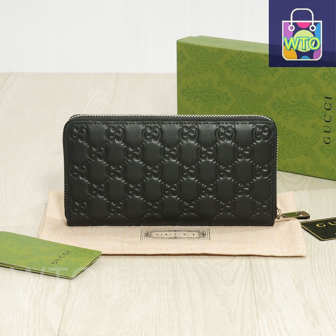 今日 Gucci グッチ シングルジッパーポーチ オリジナル頭層レザー圧花で良好な手触りと充実した収納を備える