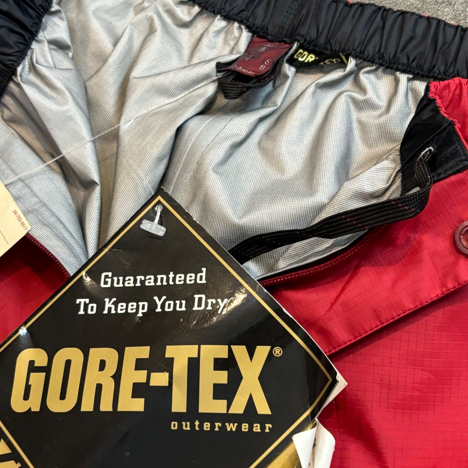 新品未使用 mont-bell GORE-TEX モンベル ゴアテックス レインダンサーパンツ ナイロンパンツ チェリーレッド タグ付き レディース