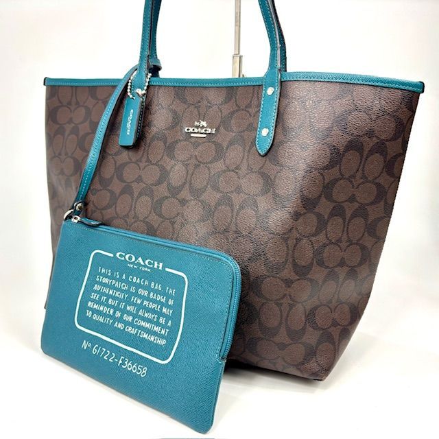 【美品】COACHリバーシブルPVCトートバッグ　ポーチ付 COACH コーチ PVC シグネチャー リバーシブル トートバッグ ポーチ付き