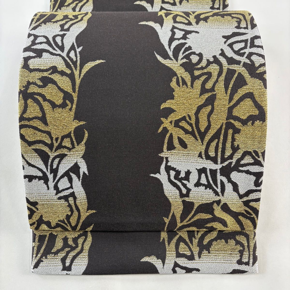 袋帯 秀品 草花 シルエット 金糸 箔 焦茶色 六通 正絹