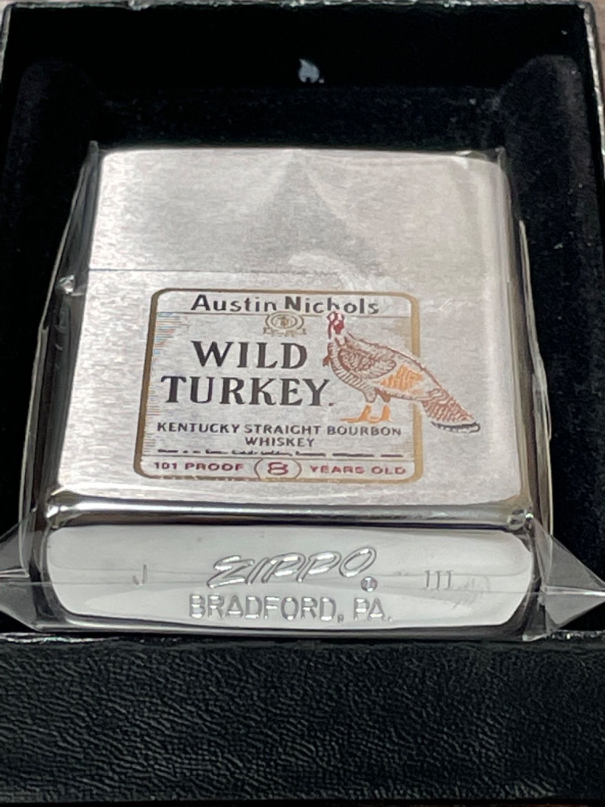 zippo ワイルドターキー 底面斜体ロゴ WILD TURKEY 年代物 1987年製 Austin Nichols （8）YEARS OLD 筆記体  BOURBON WHISKEY デットストック シルバーインナー 1987年製 ケース 保証書 - メルカリ