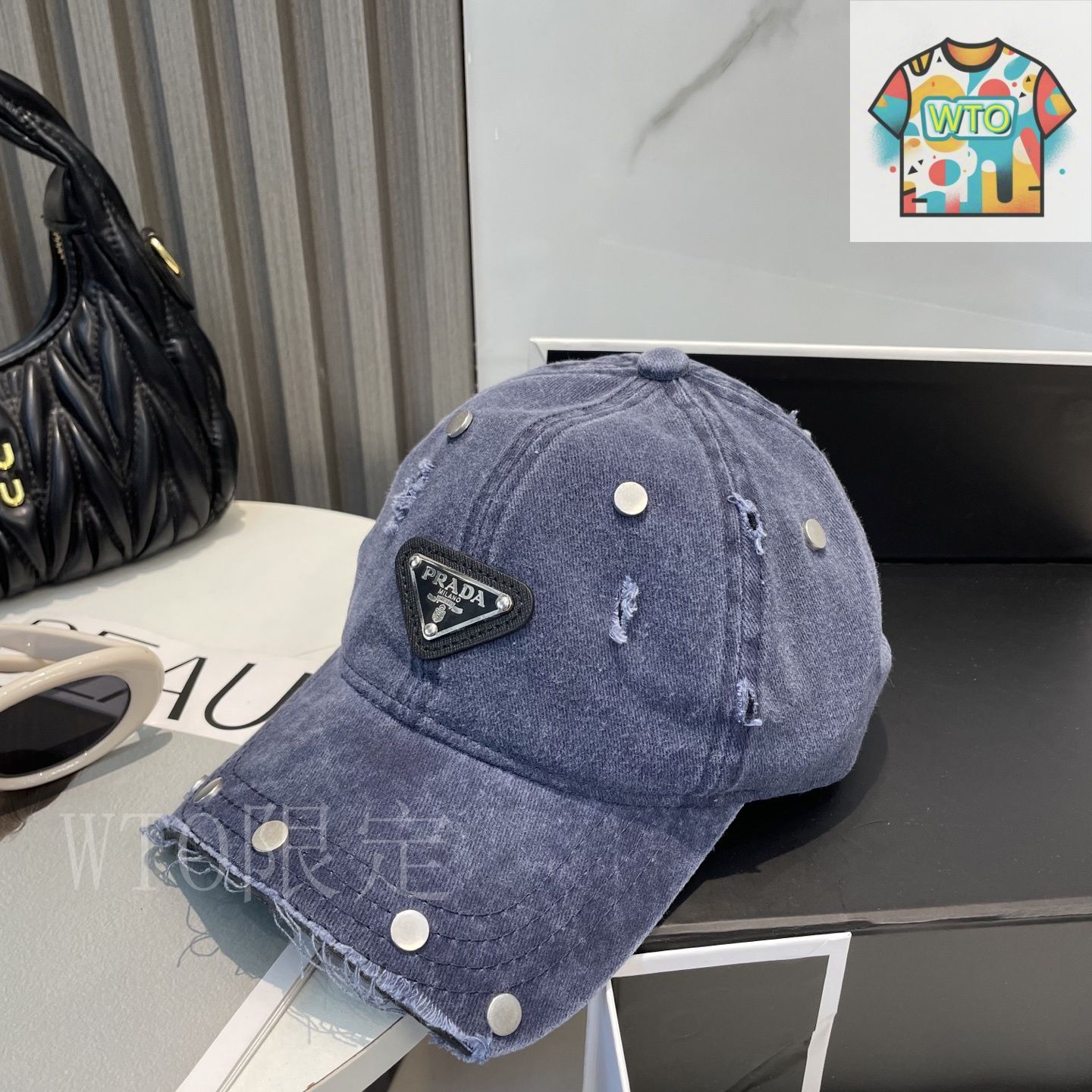 今日WTO】Prada デザインベースボールキャップ-OA35 - メルカリ