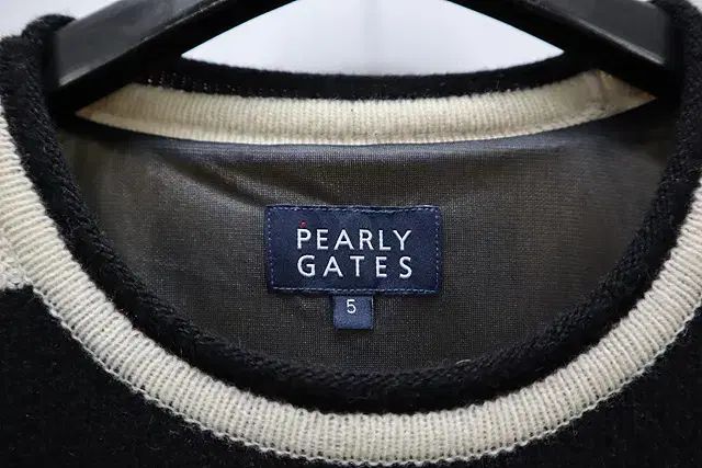 ゴルフ 防風ニット