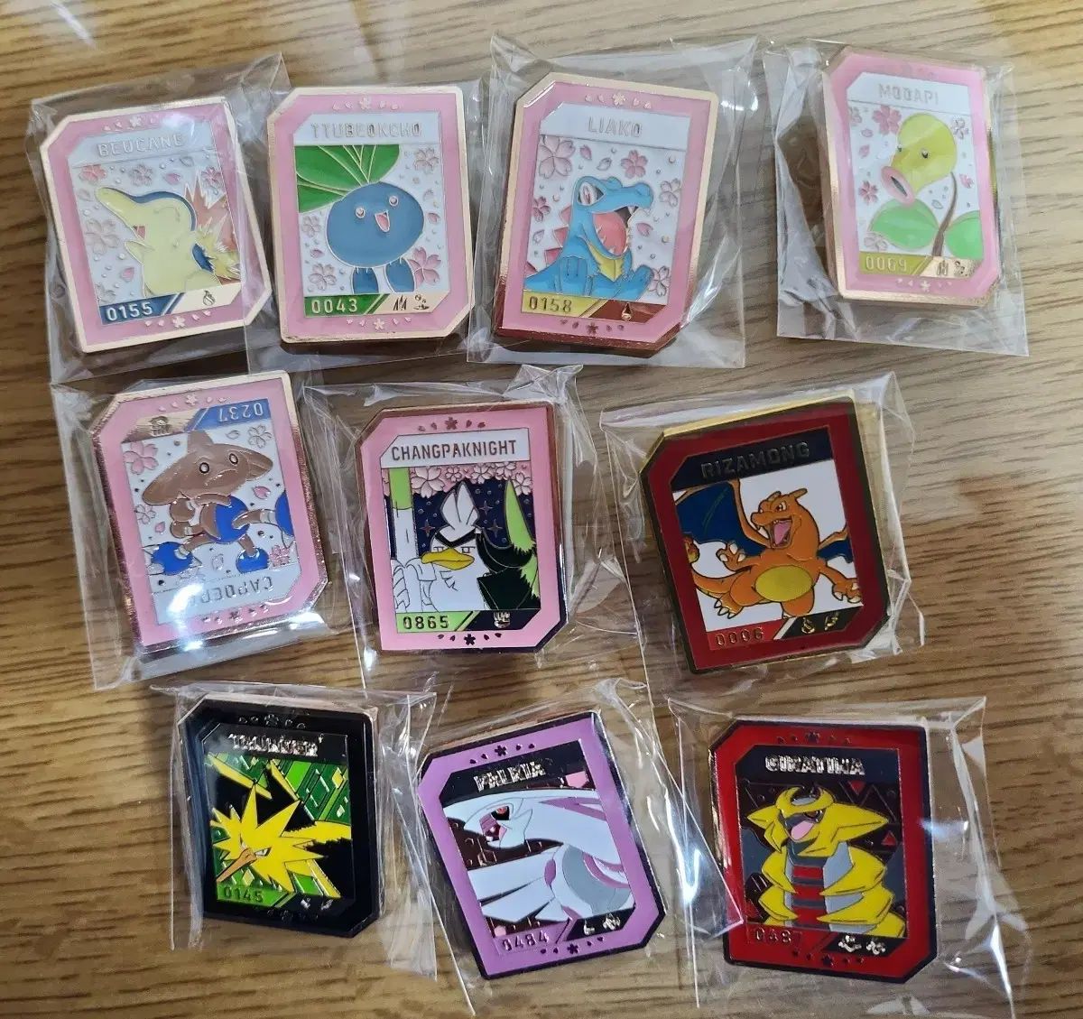 アイザック ポケットモンスター バッジ リザモン ギラティナ ペルジア 雷