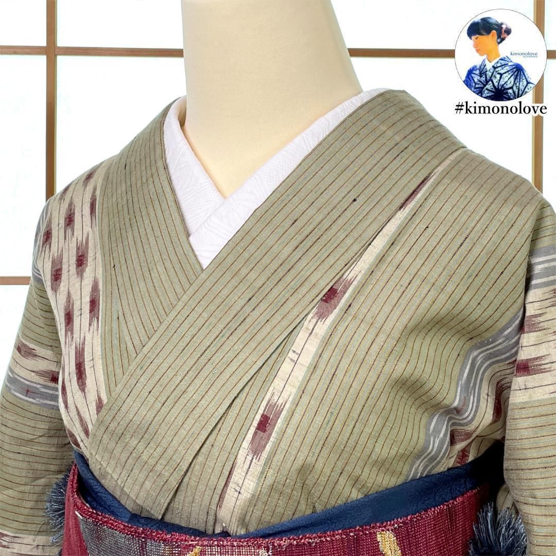 紬 着物 袷 正絹 矢羽根 ストライプ モスグリーン kimonolove 仕付糸付 リユース品 オゾン消臭サービス A-2162