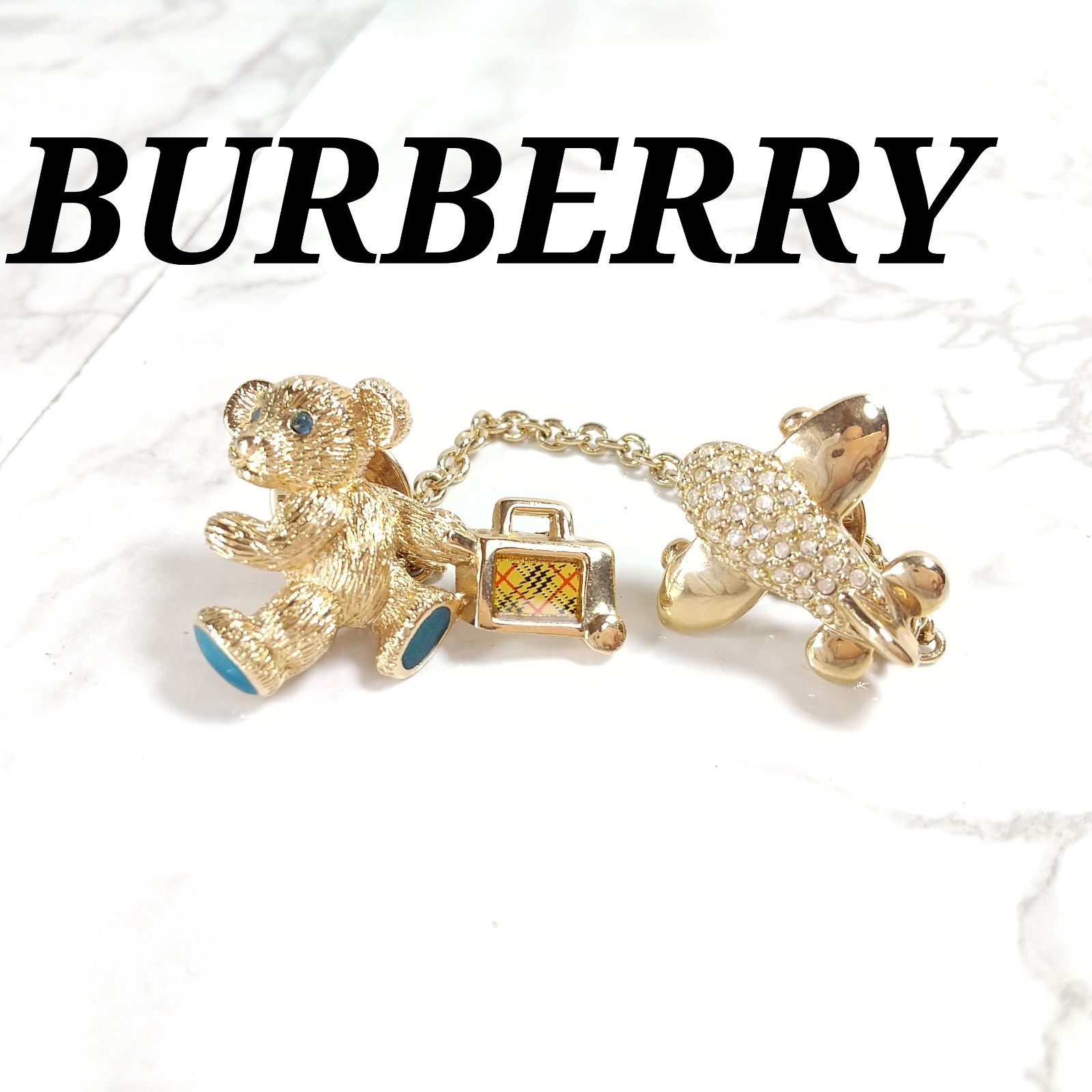 希少 美品 Burberry バーバリー×JAS限定 クマ ベア 飛行機 ダブルチェーン ピン ブローチ ノバチェックトランク ゴールド - メルカリ