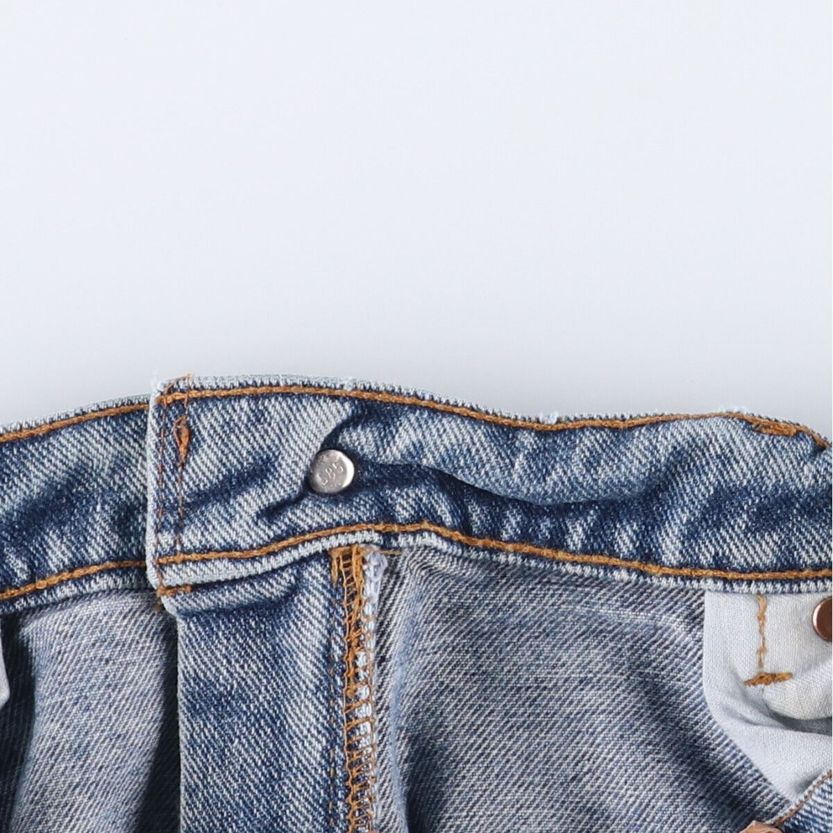 560 テーパードデニムパンツ