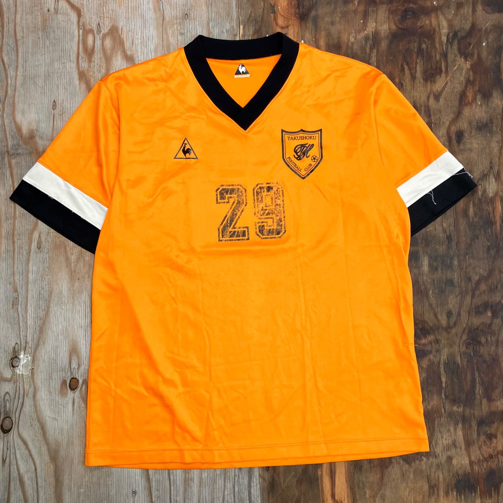 le coq sportif ルコックスポルティフ ゲームシャツ Vネック オレンジ