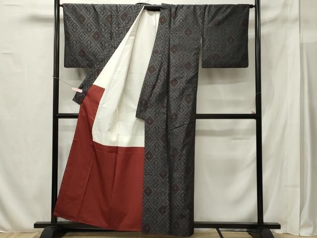 平和屋着物○本場大島紬 六通柄袋帯 狩猟更紗花文 総絣